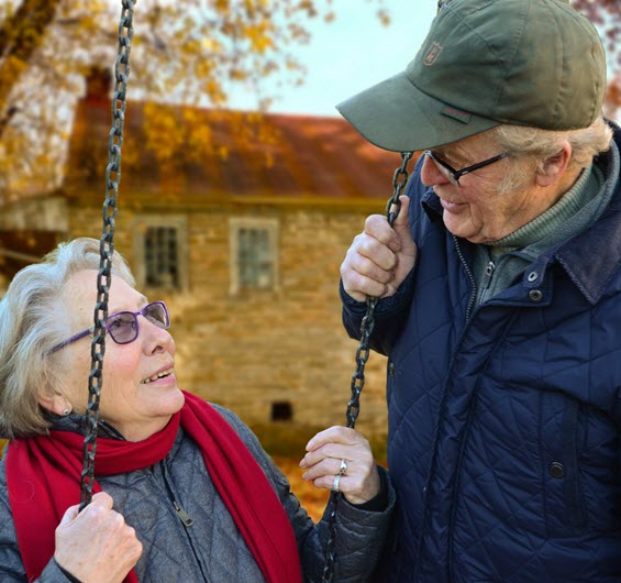 Image of elderly couple swinging from The Compounding Lab in Dayton, Ohio website.
