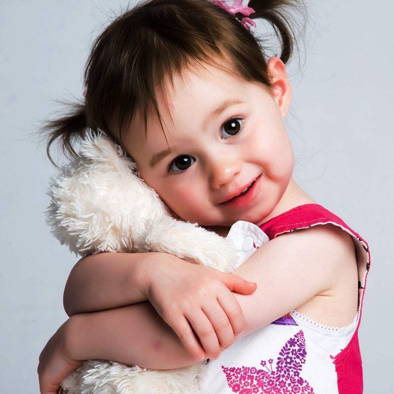 Image of toddler girl hugging a stuffed animal  from The Compounding Lab in Dayton, Ohio.